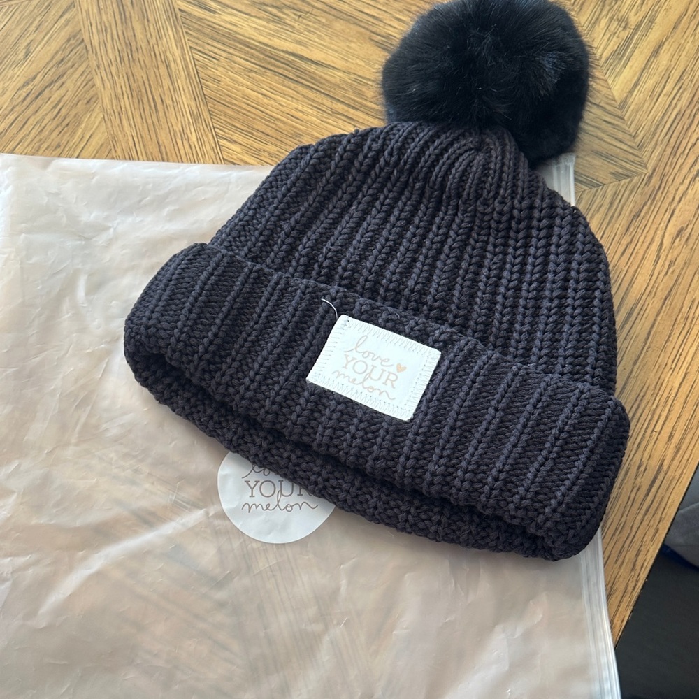Love Your Melon Black with White and Rose Gold Patch Knit Pom-Pom Beanie